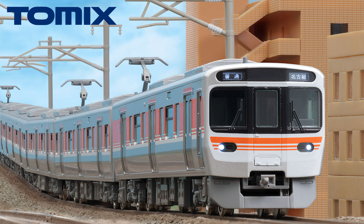 建物・線路・架線柱と組み合わせた配置例。車両以外はセット外。ジオラマ写真：TOMIX公式商品資料。